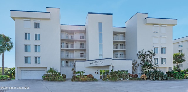 view of building exterior with a garage