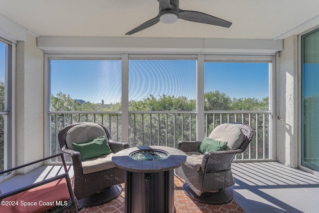 sunroom / solarium with ceiling fan