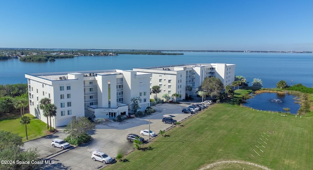 drone / aerial view with a water view