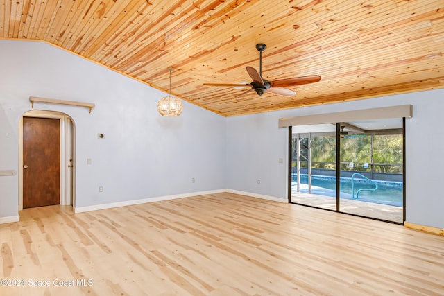 empty room with vaulted ceiling, wooden ceiling, ceiling fan, and light wood-type flooring