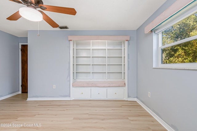 unfurnished bedroom featuring ceiling fan and light hardwood / wood-style flooring