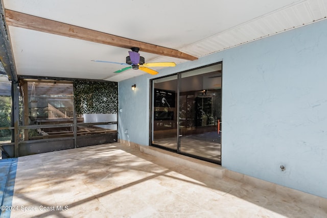 view of patio / terrace featuring ceiling fan