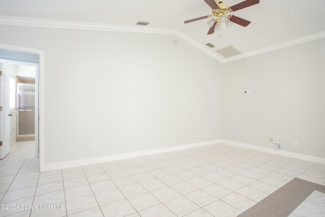 tiled empty room featuring ceiling fan, lofted ceiling, and ornamental molding