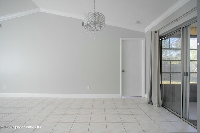 empty room featuring a chandelier, vaulted ceiling, ornamental molding, and light tile patterned flooring