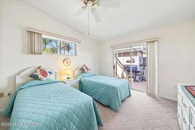 carpeted bedroom featuring multiple windows, ceiling fan, and lofted ceiling