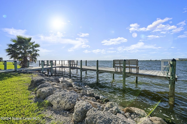 dock area featuring a water view