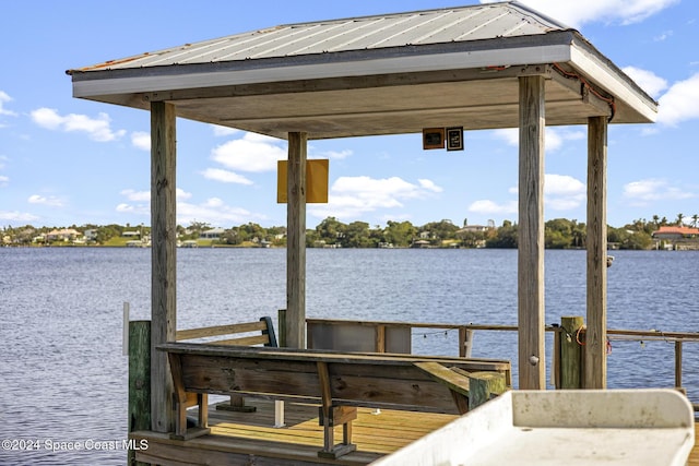 dock area featuring a water view