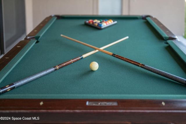 room details with pool table and cooktop