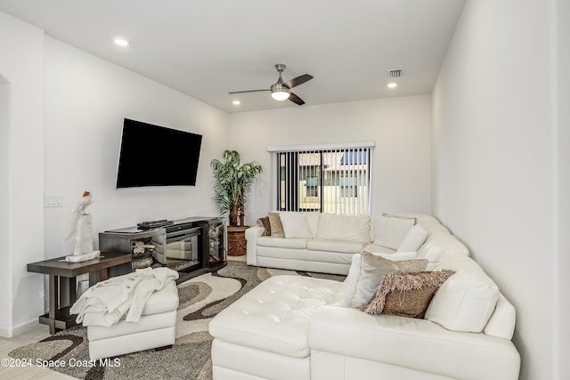 living room featuring ceiling fan