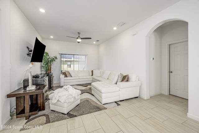 living room featuring ceiling fan