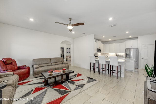 living room with ceiling fan