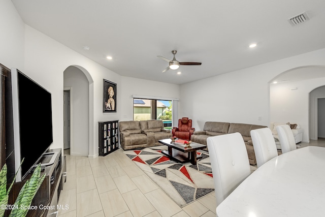 living room with ceiling fan