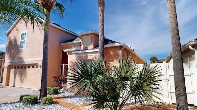 view of home's exterior with a garage