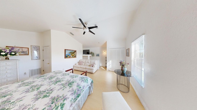 bedroom featuring vaulted ceiling and ceiling fan