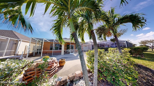 exterior space featuring a lanai and a patio