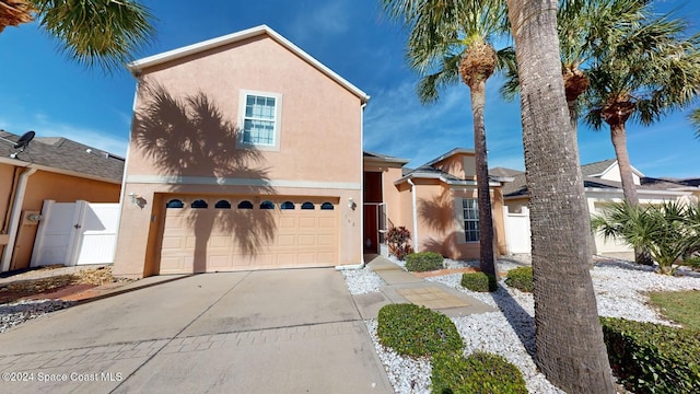 view of front of property with a garage