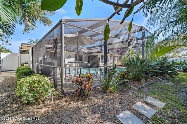 view of pool featuring a lanai