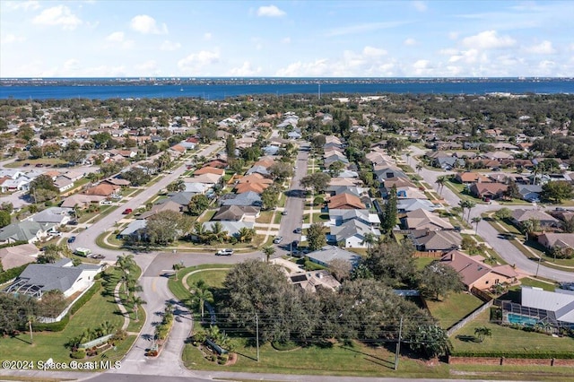 bird's eye view with a water view