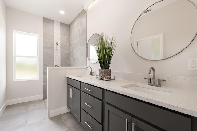 bathroom featuring tile patterned floors and vanity