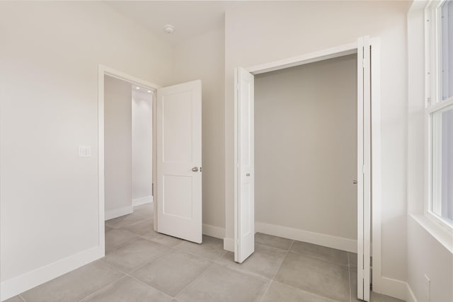 interior space with light tile patterned floors