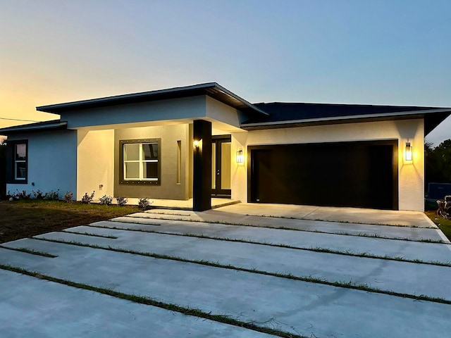 view of front of home featuring a garage