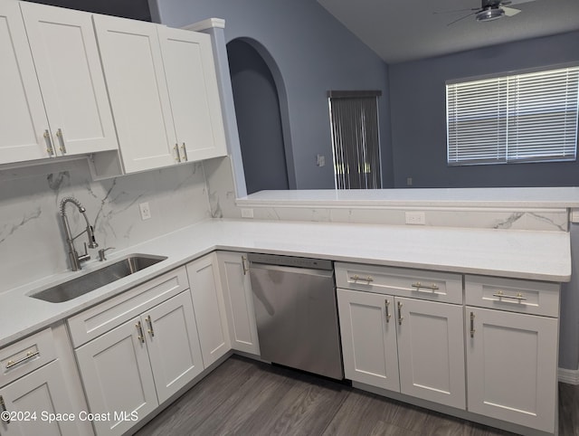 kitchen featuring white cabinets, sink, stainless steel dishwasher, ceiling fan, and dark hardwood / wood-style flooring