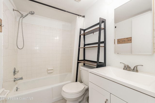 full bathroom with vanity, toilet, and shower / bath combo with shower curtain