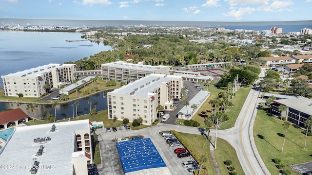 drone / aerial view with a water view