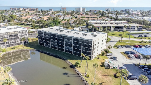 bird's eye view with a water view