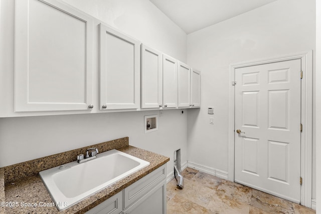 laundry area featuring cabinets, washer hookup, hookup for an electric dryer, and sink