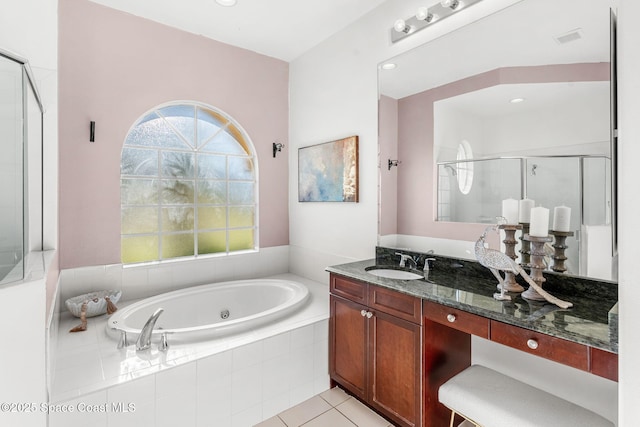 bathroom with tile patterned floors, vanity, and plus walk in shower