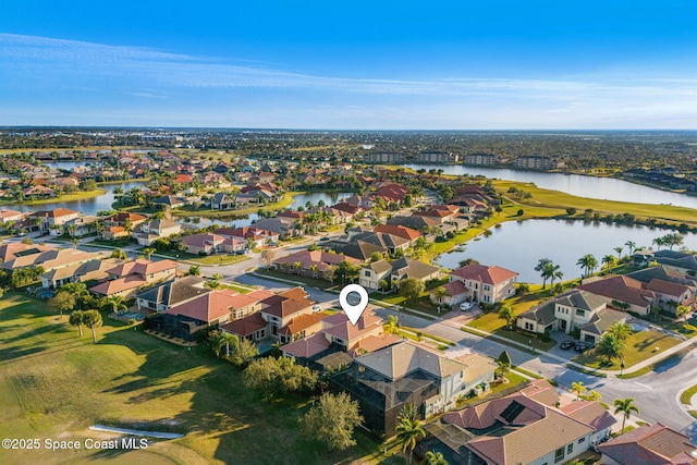 drone / aerial view featuring a water view