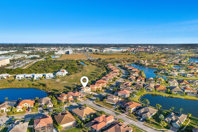 drone / aerial view with a water view