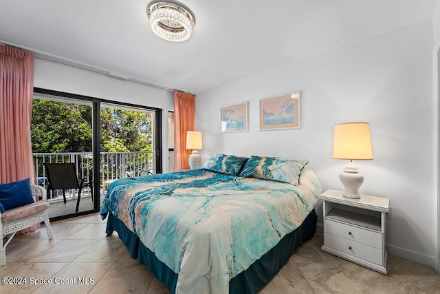 bedroom featuring access to outside and light tile patterned flooring