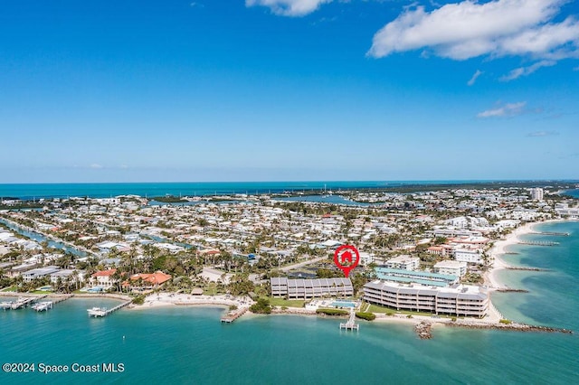 bird's eye view with a beach view and a water view