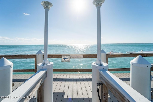 dock area featuring a water view