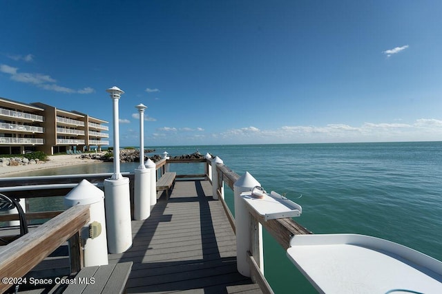 view of dock with a water view