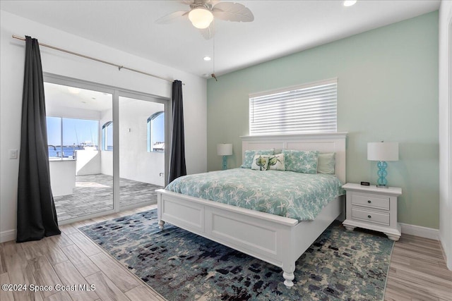 bedroom featuring a ceiling fan, access to outside, wood finished floors, recessed lighting, and baseboards