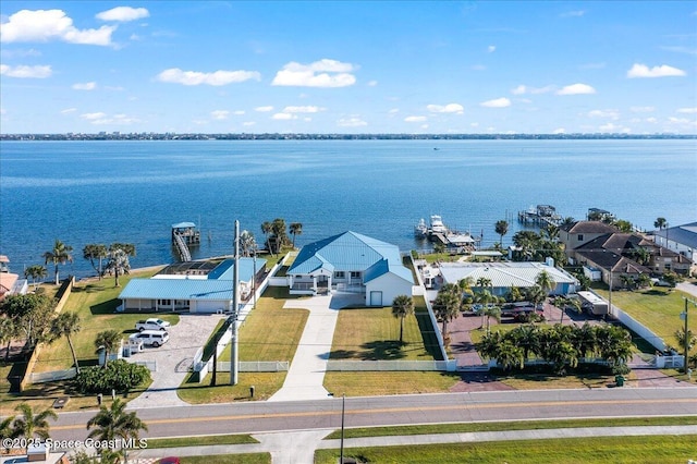 bird's eye view with a residential view and a water view