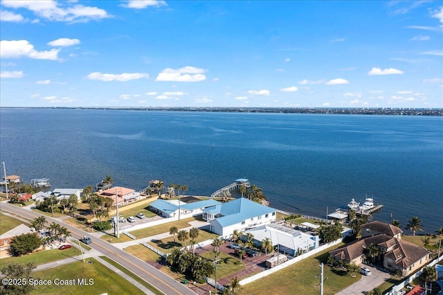 bird's eye view with a water view and a residential view