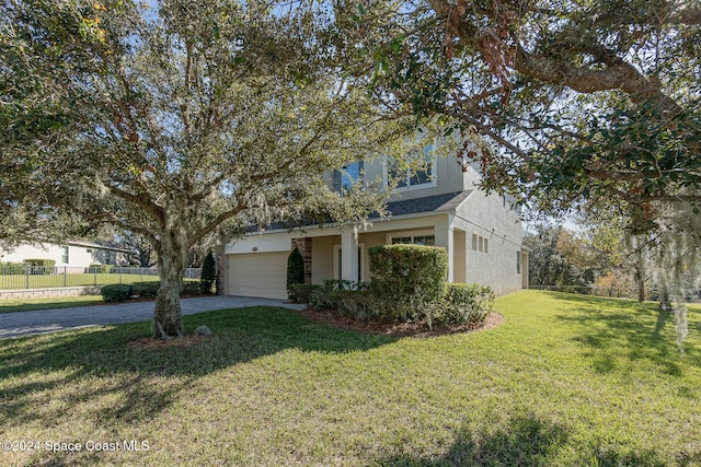 view of front facade featuring a front yard