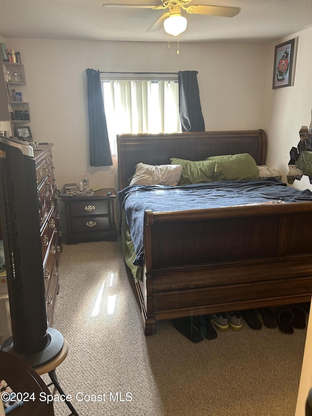 bedroom with carpet floors and ceiling fan