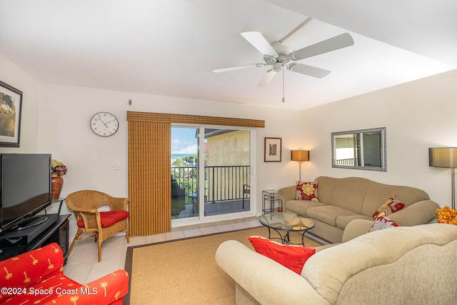 living room featuring ceiling fan and light tile patterned floors