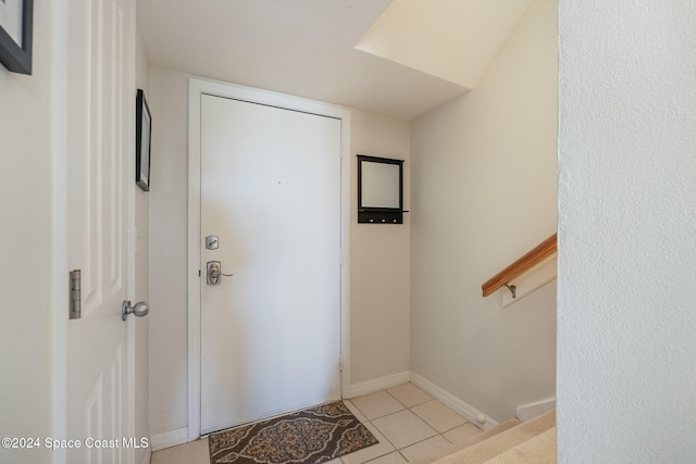 foyer with light tile patterned floors