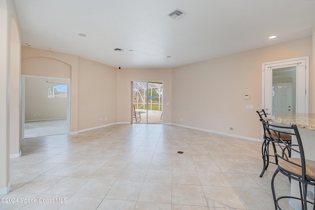 empty room featuring light tile patterned floors