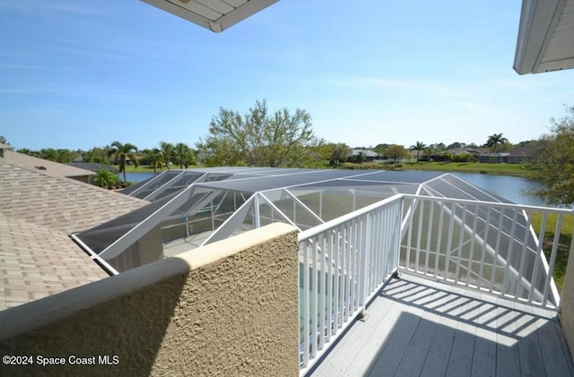 balcony featuring a water view