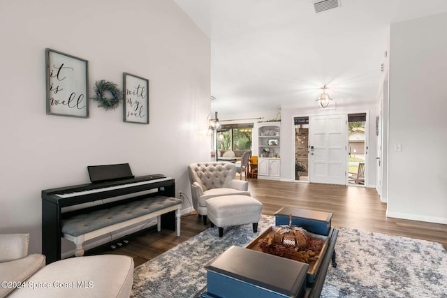 living room featuring dark wood-type flooring