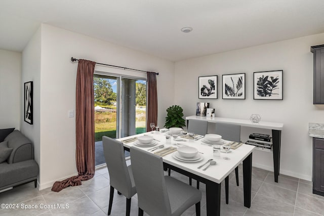 dining room with light tile patterned floors