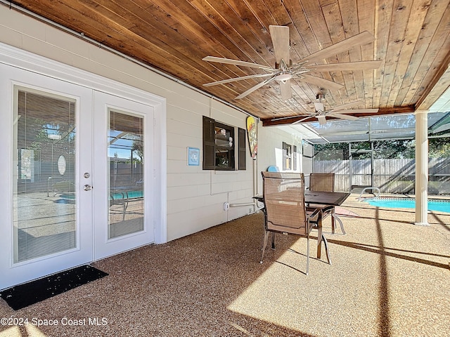 1037 Poinsetta St, Cocoa, FL 32927 - sunroom / solarium with french doors and ceiling fan