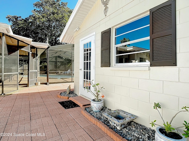 1037 Poinsetta St, Cocoa, FL 32927 - view of patio / terrace with an outdoor pool